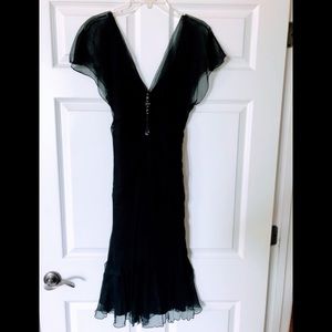 Black 100% silk dress,still with tags, size 6.